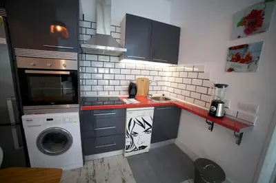 Una cocina o zona de cocina en Apartments Madrid Las Letras