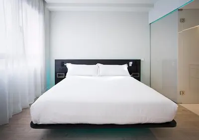 Cama o camas de una habitación en B&B HOTEL Madrid Centro Puerta del Sol