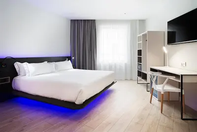 Cama o camas de una habitación en B&B HOTEL Madrid Centro Puerta del Sol