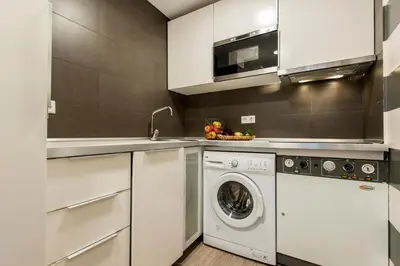 Una cocina o zona de cocina en Apartamento con Estilo en Plaza España - Ubicación Premium