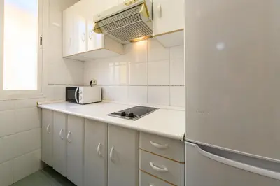 Una cocina o zona de cocina en For You Rentals reina sofia apartment TEMPORAL DFO214