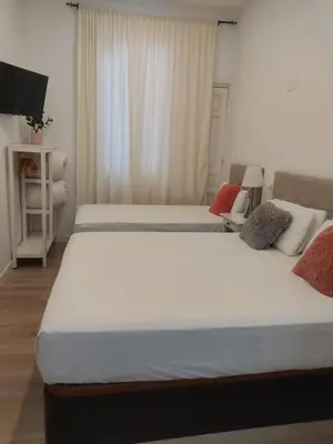 Cama o camas de una habitación en Grand Via House