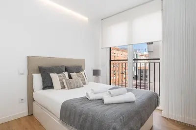 Cama o camas de una habitación en Waou Plaza de España VI - Alquiler Corta Duración