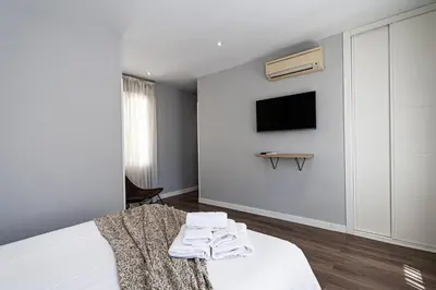 Cama o camas de una habitación en Ático en la Gran Vía con Terraza