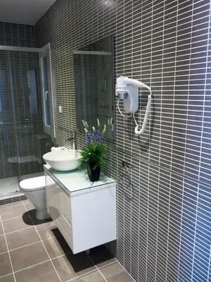 Un baño de Ático en la Gran Vía con Terraza