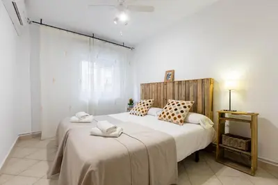Cama o camas de una habitación en Apavonia Apartamento 3 dormitorio Distrito Latina Madrid