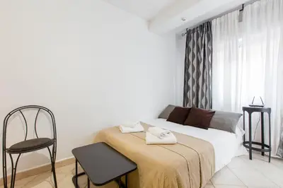 Cama o camas de una habitación en Apavonia Apartamento 3 dormitorio Distrito Latina Madrid