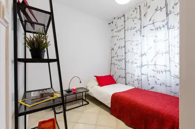 Cama o camas de una habitación en Apavonia Apartamento 3 dormitorio Distrito Latina Madrid