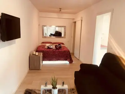 Una televisión o centro de entretenimiento en Apartment in Sol