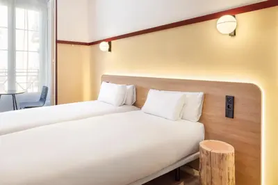 Cama o camas de una habitación en B&B HOTEL Madrid Centro Plaza Mayor