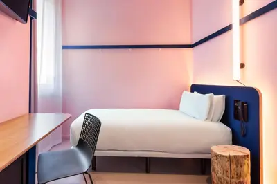 Cama o camas de una habitación en B&B HOTEL Madrid Centro Plaza Mayor