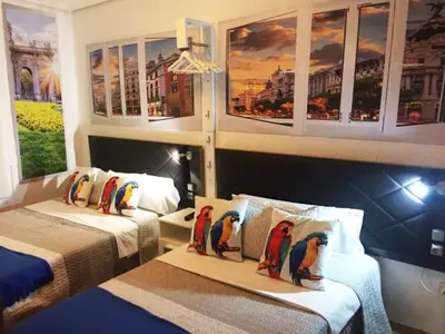 Cama o camas de una habitación en Chueca Gran Via Apartaments TPH