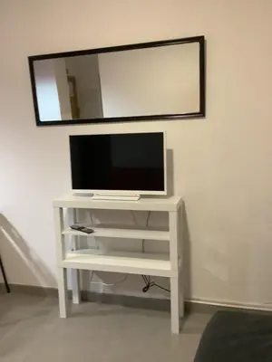 Una televisión o centro de entretenimiento en Malasaña Palma Studios