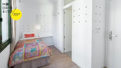 Cama o camas de una habitación en Madridcito