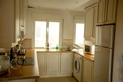Una cocina o zona de cocina en Oriente Palace Apartments