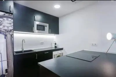 Una cocina o zona de cocina en Puerta del Sol Center