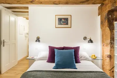 Cama o camas de una habitación en Waou Puerta del Sol I - Alquiler Corta Duración