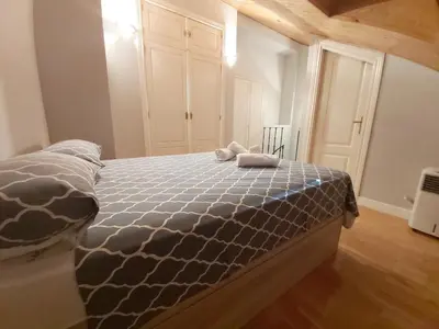 Cama o camas de una habitación en Apartments Madrid Principe