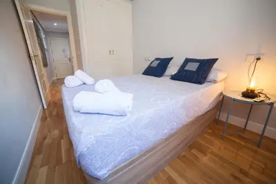 Cama o camas de una habitación en Apartments Madrid Principe