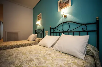 Cama o camas de una habitación en AVA Rooms