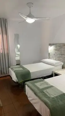 Cama o camas de una habitación en Casa de Huéspedes Almansa