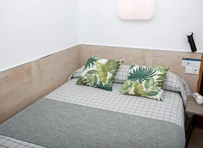 Cama o camas de una habitación en Hostal Castilla II Puerta del Sol
