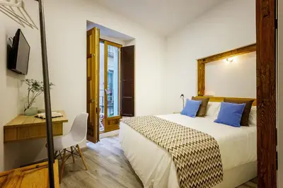 Cama o camas de una habitación en Jardines Boutique