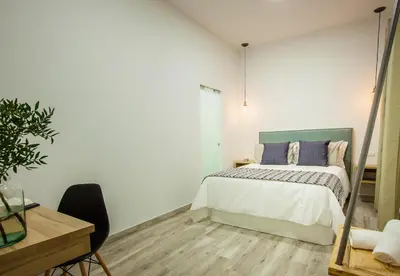 Cama o camas de una habitación en Jardines Boutique
