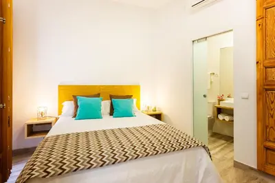 Cama o camas de una habitación en Jardines Boutique