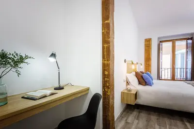 Cama o camas de una habitación en Jardines Boutique