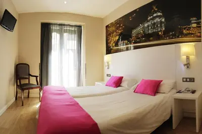 Cama o camas de una habitación en CH Olmedo