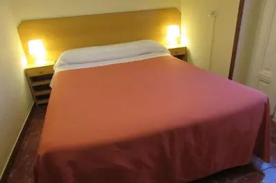 Cama o camas de una habitación en Hostal Prim