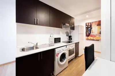 Una cocina o zona de cocina en Apartamentos Day Madrid GRAN VIA II