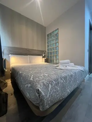 Cama o camas de una habitación en Hostal Abril Madrid