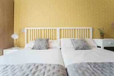 Cama o camas de una habitación en Premium Home Gran Vía