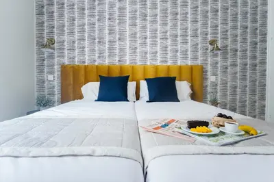 Cama o camas de una habitación en Premium Home Gran Vía