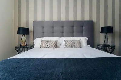 Cama o camas de una habitación en Premium Home Gran Vía