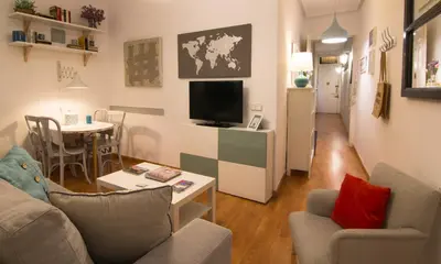 Una televisión o centro de entretenimiento en Apartamento Vive en Maravillas