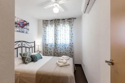 Cama o camas de una habitación en Apavonia Apartamento 2 Dormitorios Distrito Latina Madrid