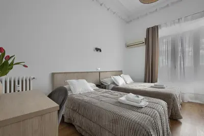 Cama o camas de una habitación en Hostal Besaya