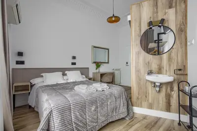 Cama o camas de una habitación en Hostal Besaya