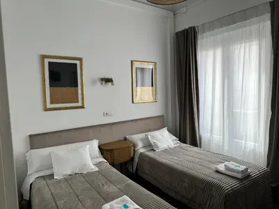 Cama o camas de una habitación en Hostal Besaya