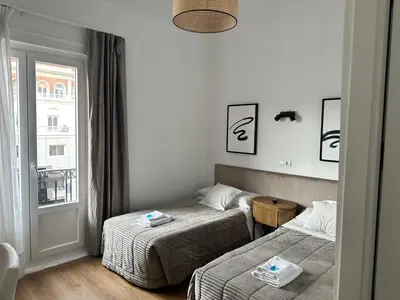 Cama o camas de una habitación en Hostal Besaya
