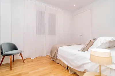 Cama o camas de una habitación en Juan Bravo Suites
