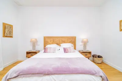 Cama o camas de una habitación en Juan Bravo Suites