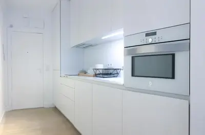 Una cocina o zona de cocina en Lujoso apto calle mayor