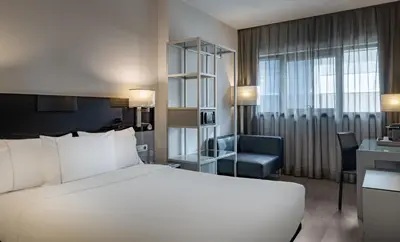 Cama o camas de una habitación en AC Hotel Atocha by Marriott