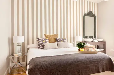 Cama o camas de una habitación en Casa Malasaña