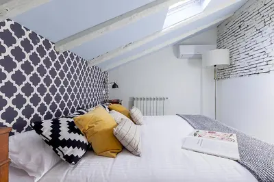 Cama o camas de una habitación en Casa Malasaña