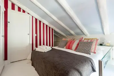 Cama o camas de una habitación en Casa Malasaña